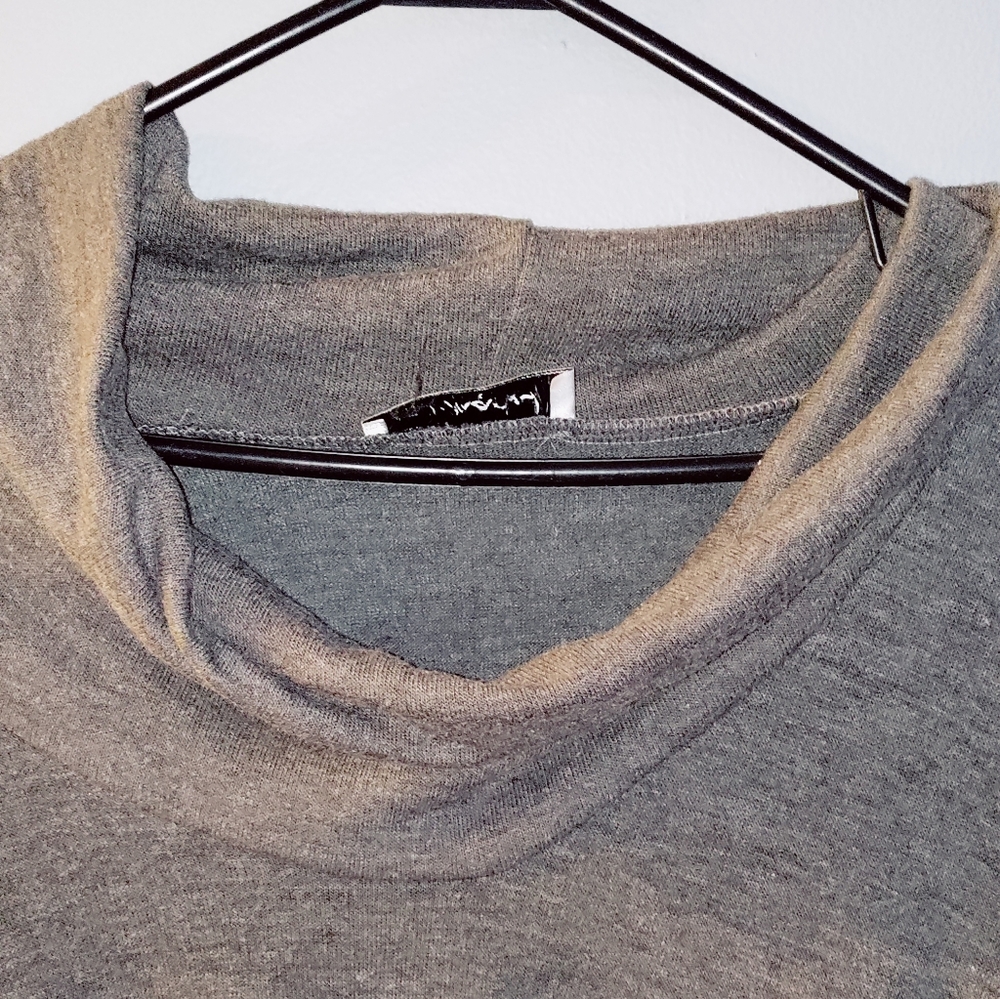 "Shark bite" shirt. Cowl neck.